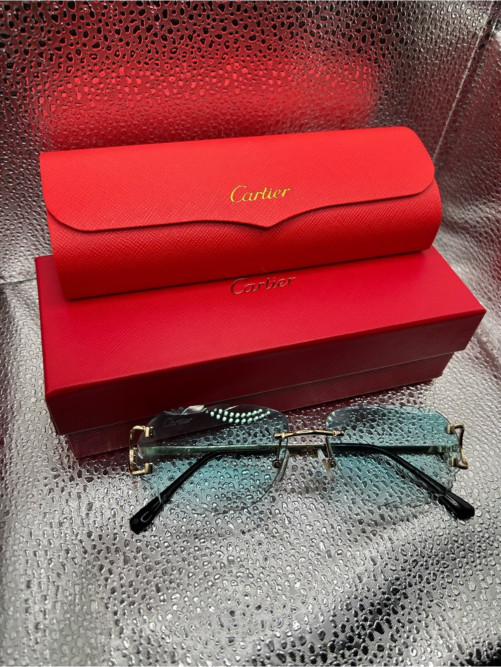 Rimless Sunglasses with Blue-Green Gradient Lenses and Gold Accents
